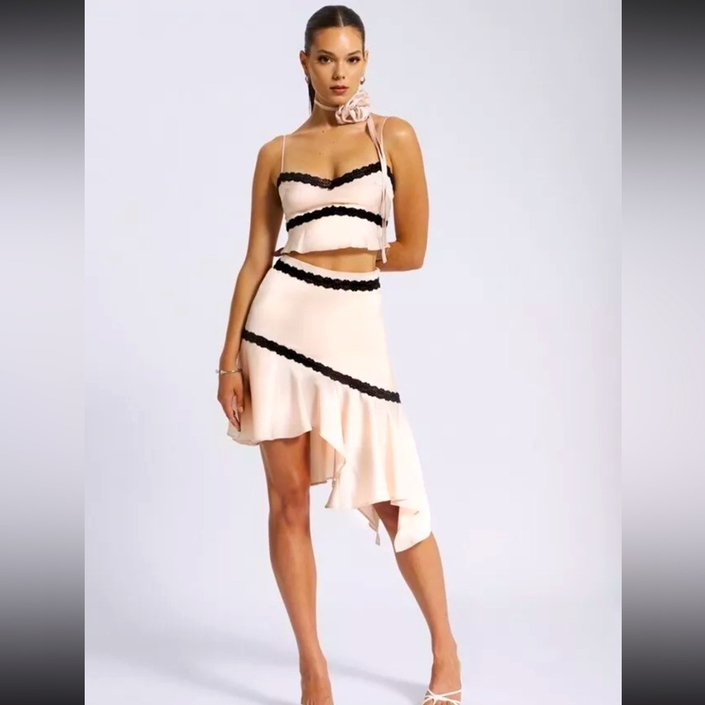 Two-Piece Pink Asymmetric Skirt Set with Black Trim